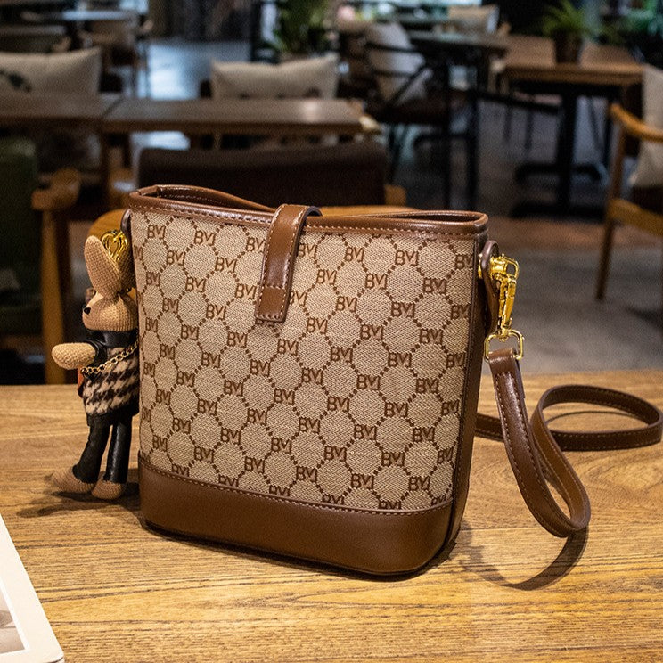 Women's Rabbit Muse Bucket Bag - Heritage Print & Crafted Leather Convertible Carry with Signature Charm & Optimized Capacity