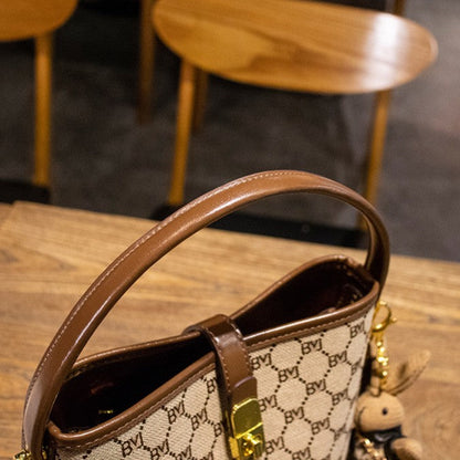 Women's Rabbit Muse Bucket Bag - Heritage Print & Crafted Leather Convertible Carry with Signature Charm & Optimized Capacity