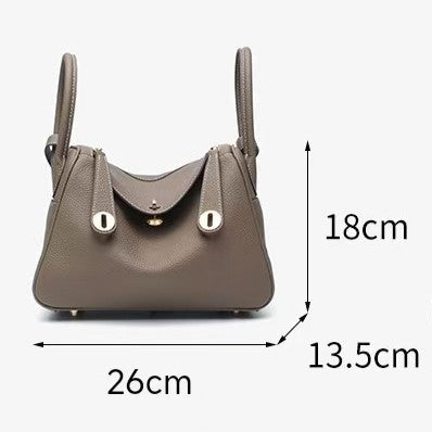 Women's Orsay Pebbled Bucket — Artisan-Stitched Top-Grain Leather Tote with Convertible Carry & Structured Silhouette
